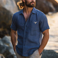 Casual Blue Button-Up Shirt With Embroidered Bird Design